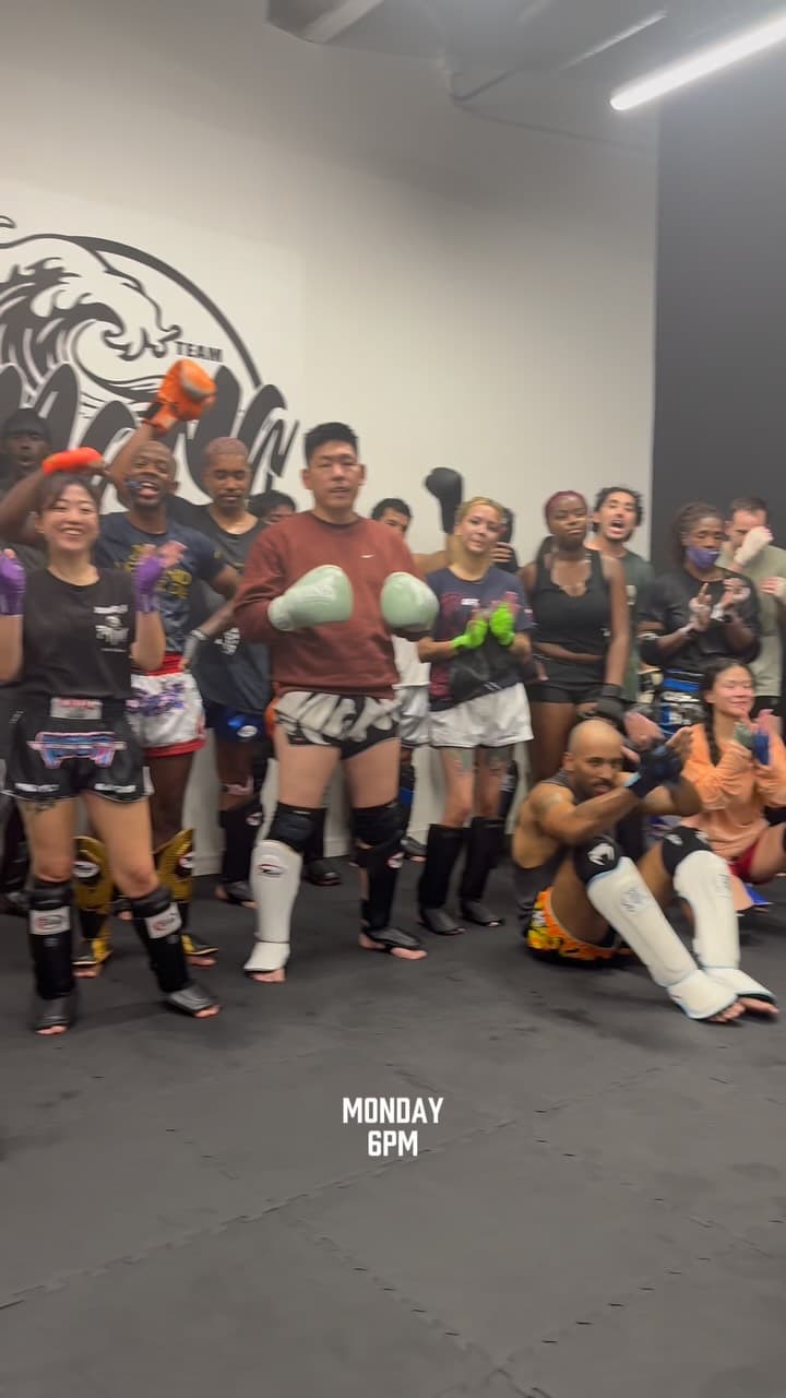 Members celebrating together at the end of a class